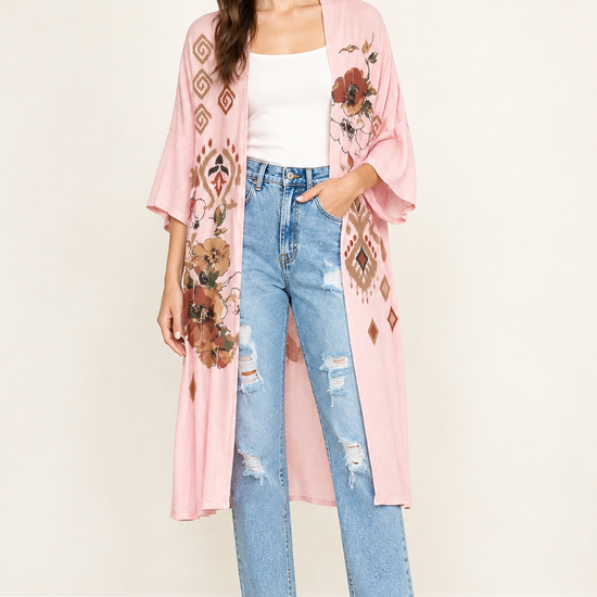 AI-styled studio outfit with pink floral kimono, distressed mom jeans, ivory tank and tan ankle boots