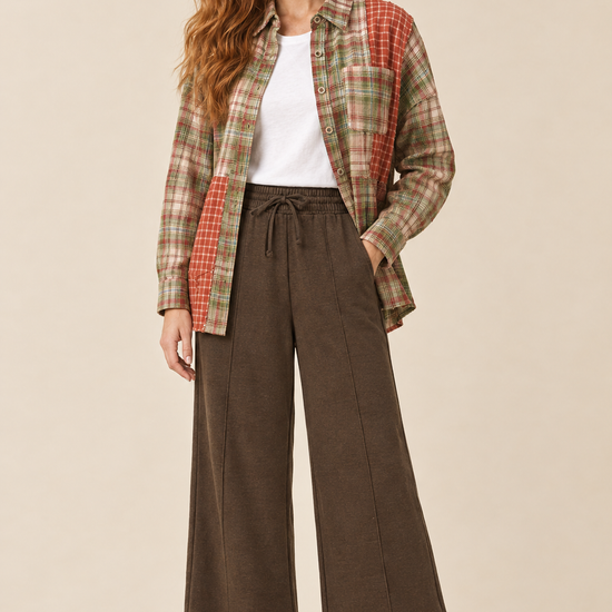 AI-styled outfit featuring espresso pintuck wide-leg pants with a mixed plaid color block shirt and white tee