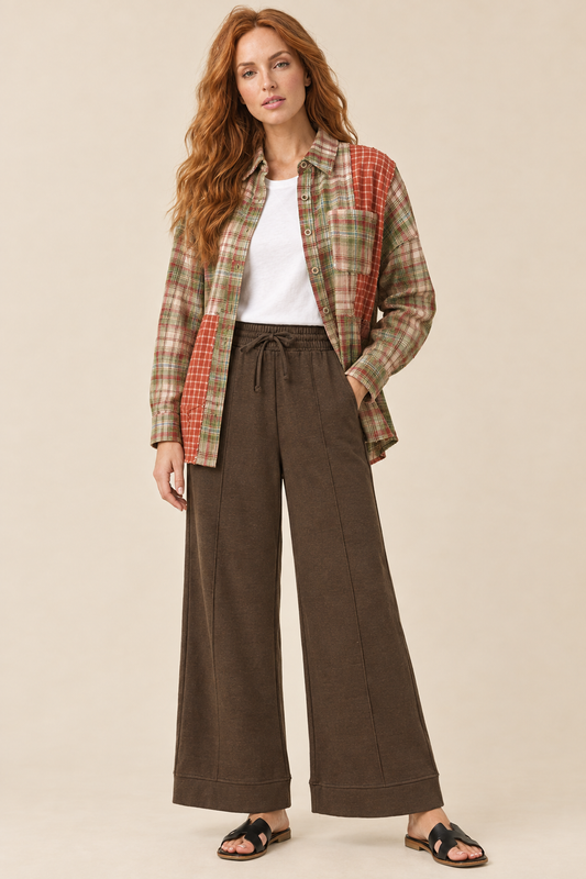 AI-styled outfit featuring espresso pintuck wide-leg pants with a mixed plaid color block shirt and white tee