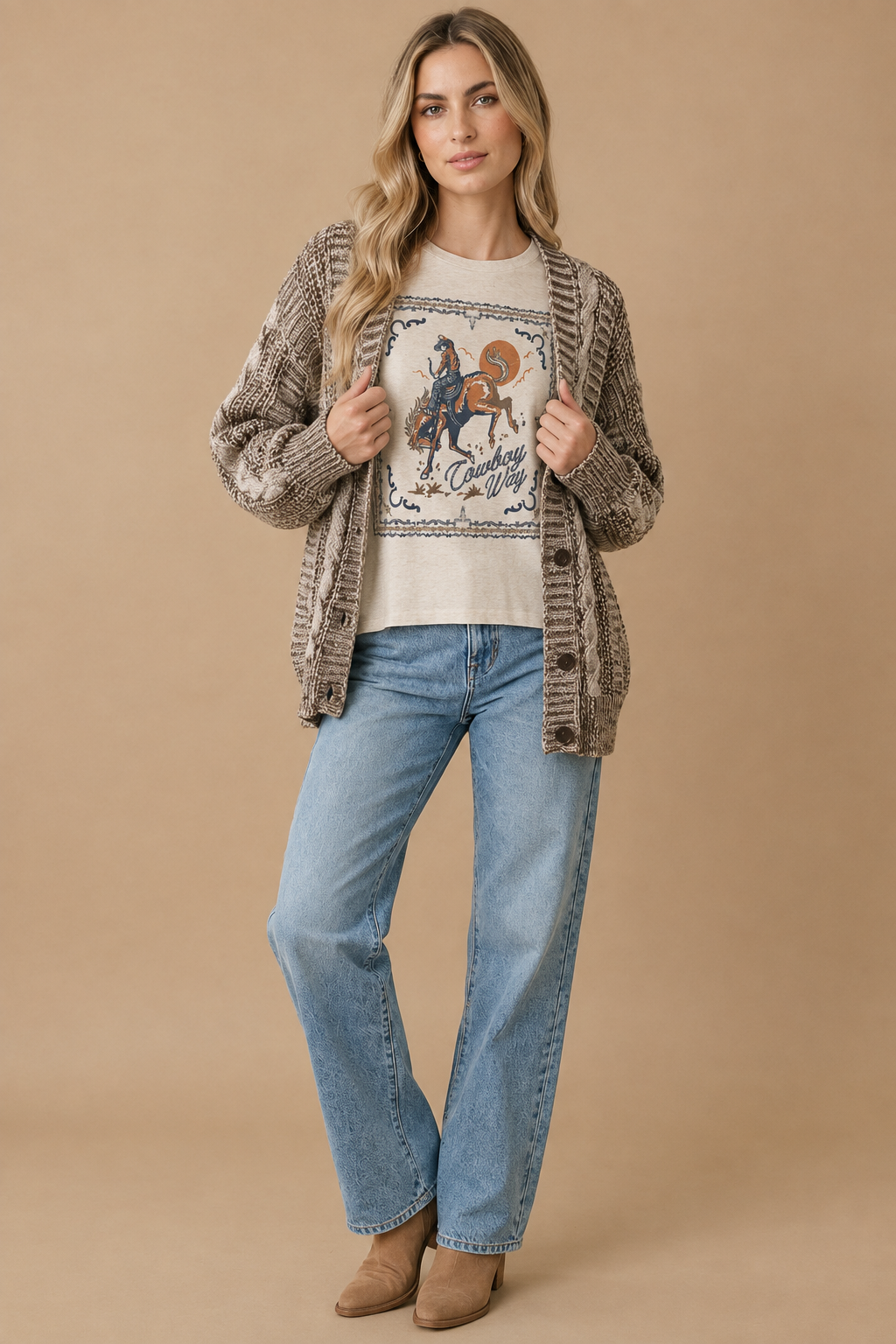 AI-styled outfit featuring the Cowboy Way graphic thermal top with a two-tone chunky cable cardigan and straight-leg jeans.