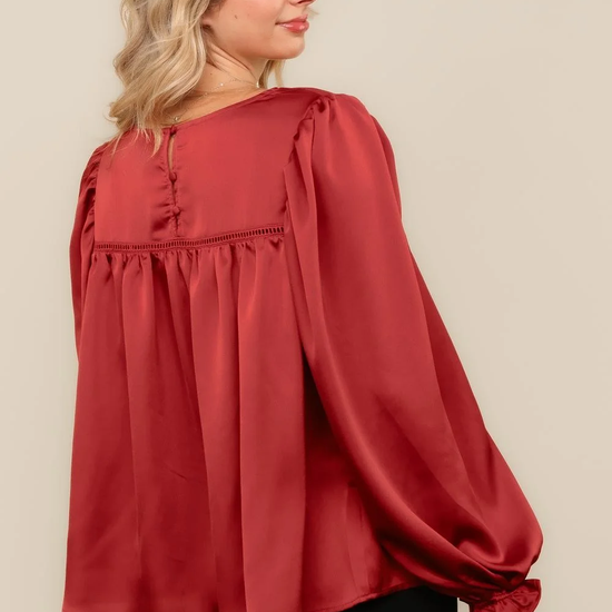 Rust satin balloon sleeve blouse, back view with button keyhole
