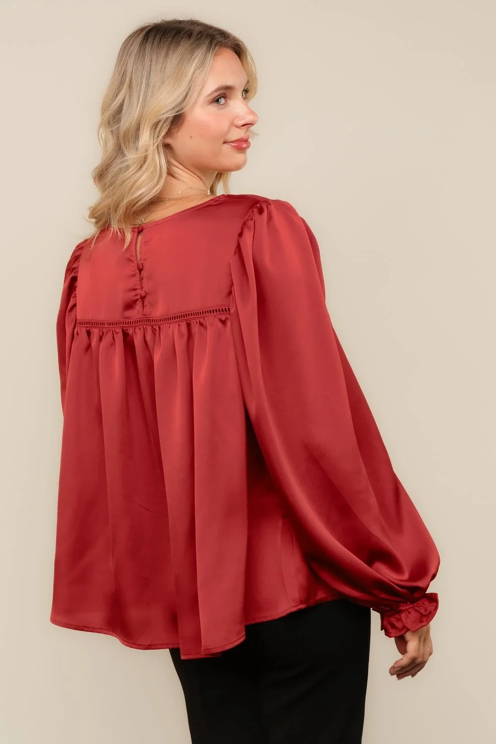 Rust satin balloon sleeve blouse, back view with button keyhole